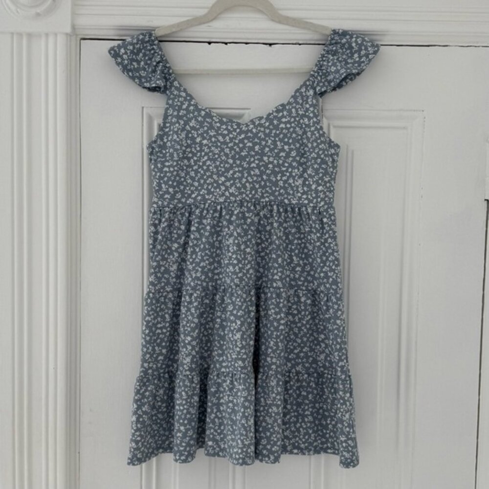 Elegant Blue and White Dress with Floral Design